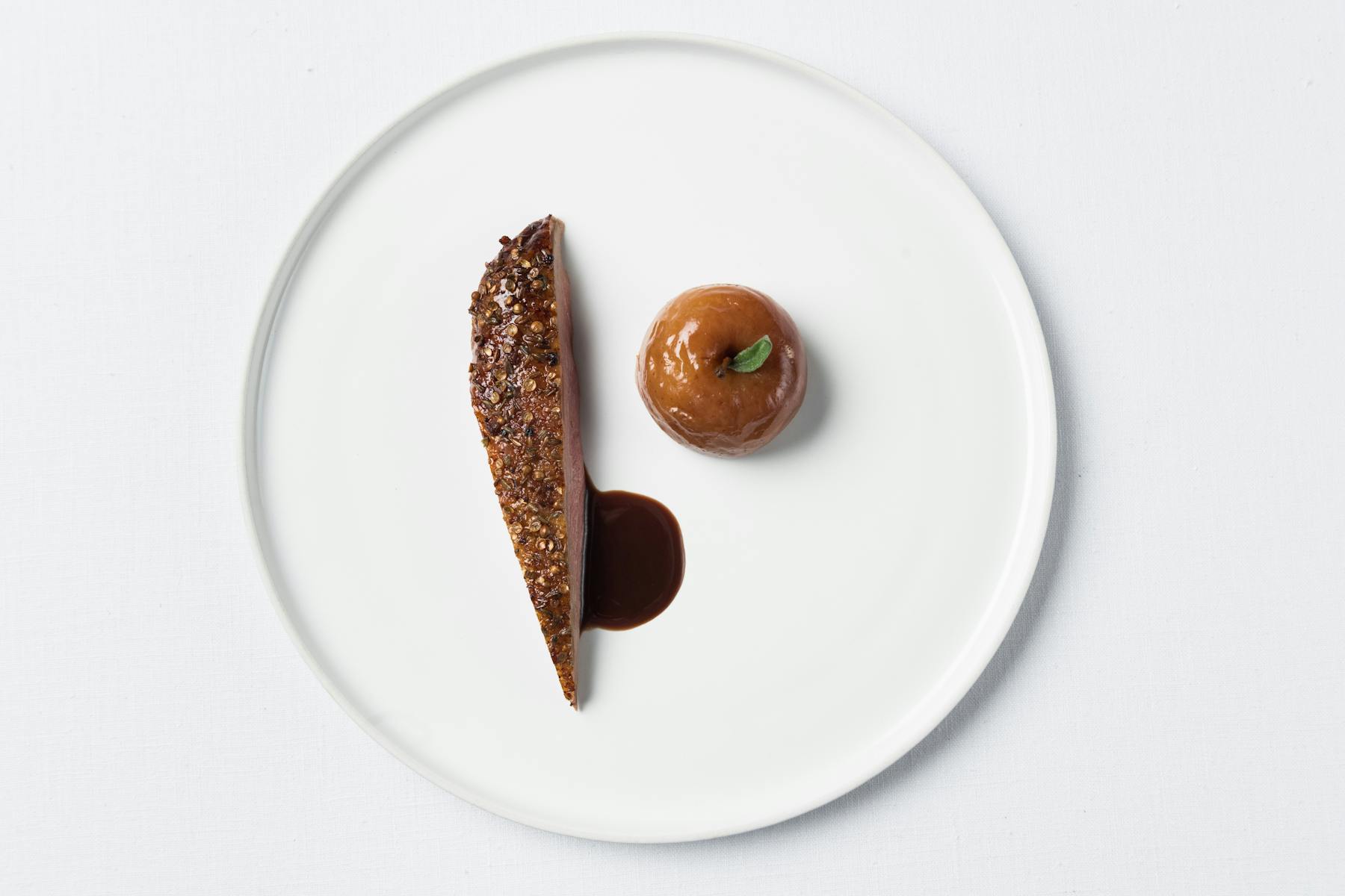 a close up of a doughnut on a plate