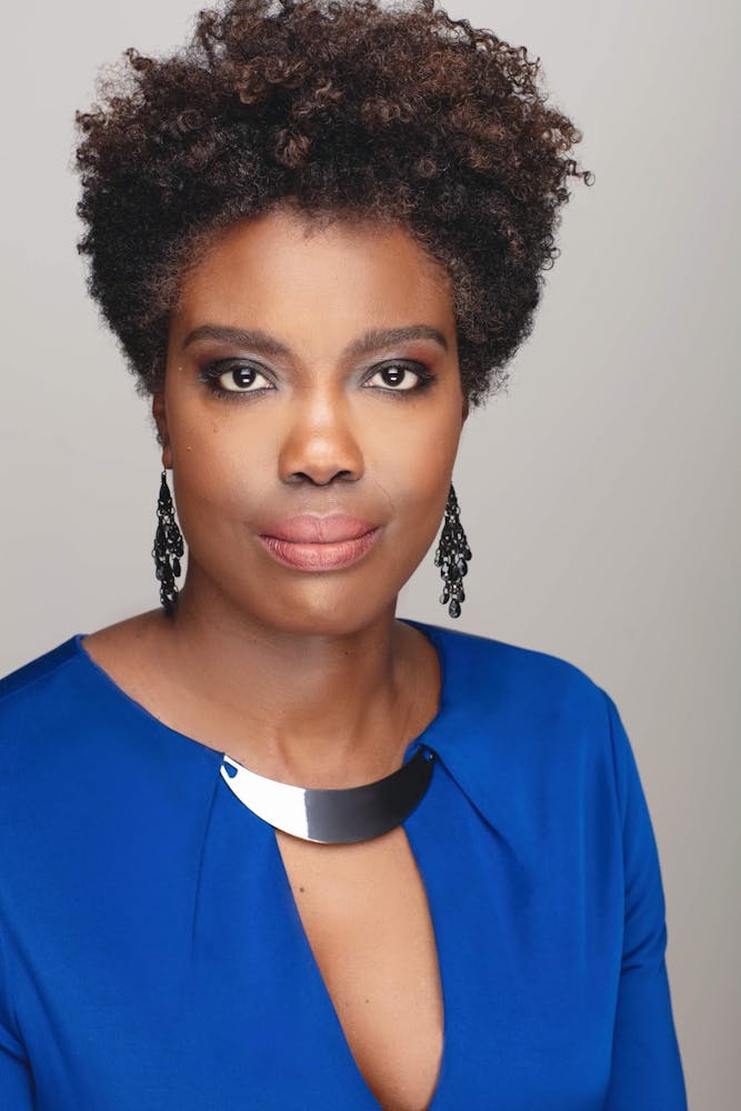 a young man wearing a blue shirt