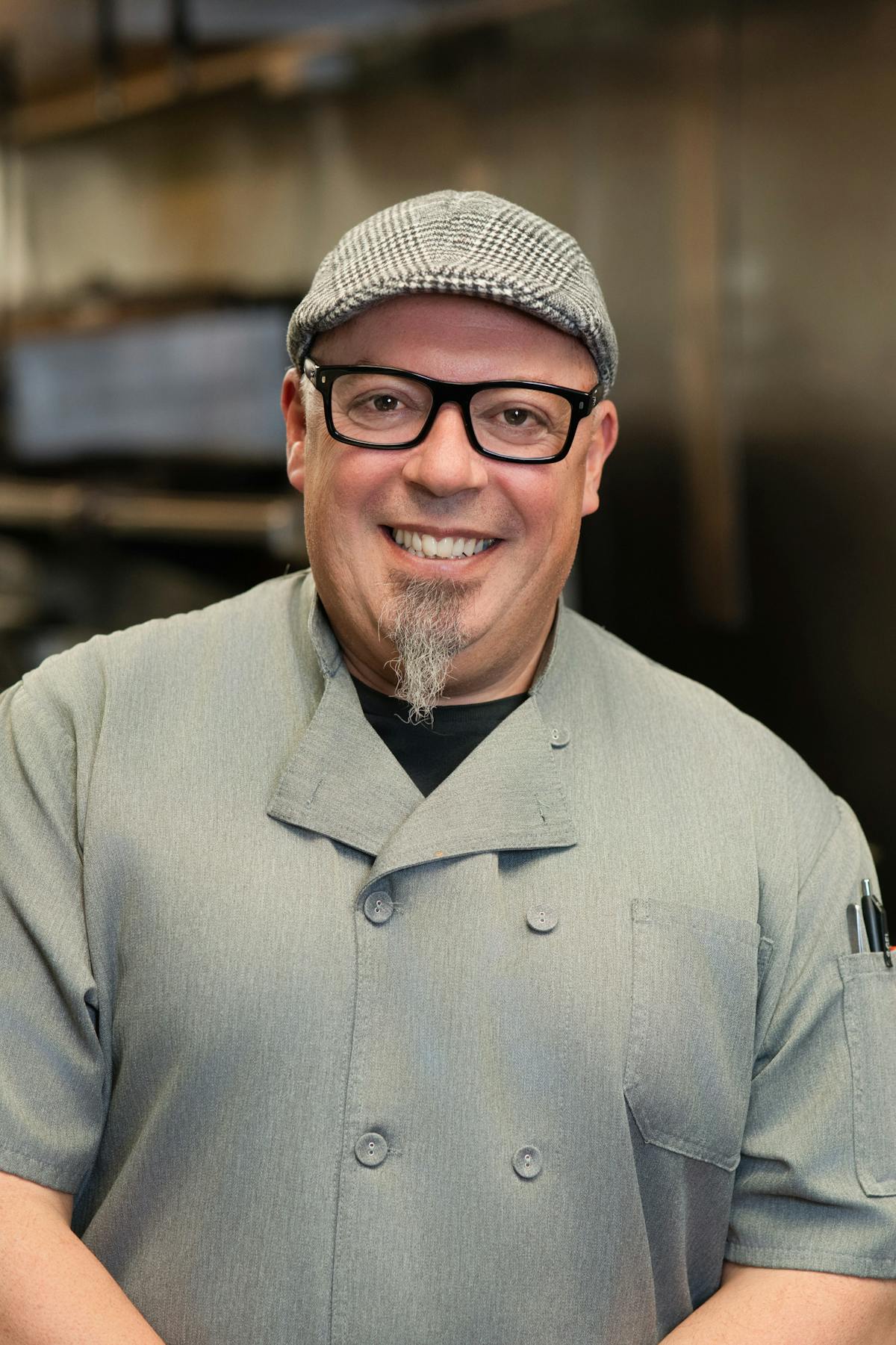 chef aldrin smiles in the kitchen