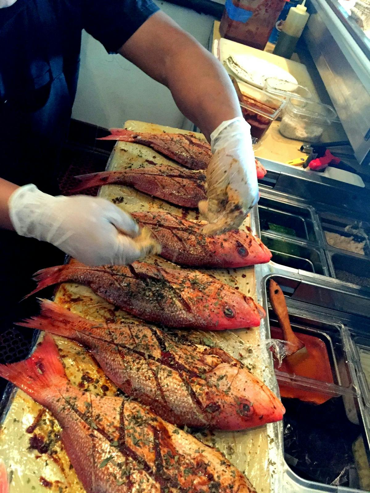 a man cutting a piece of food