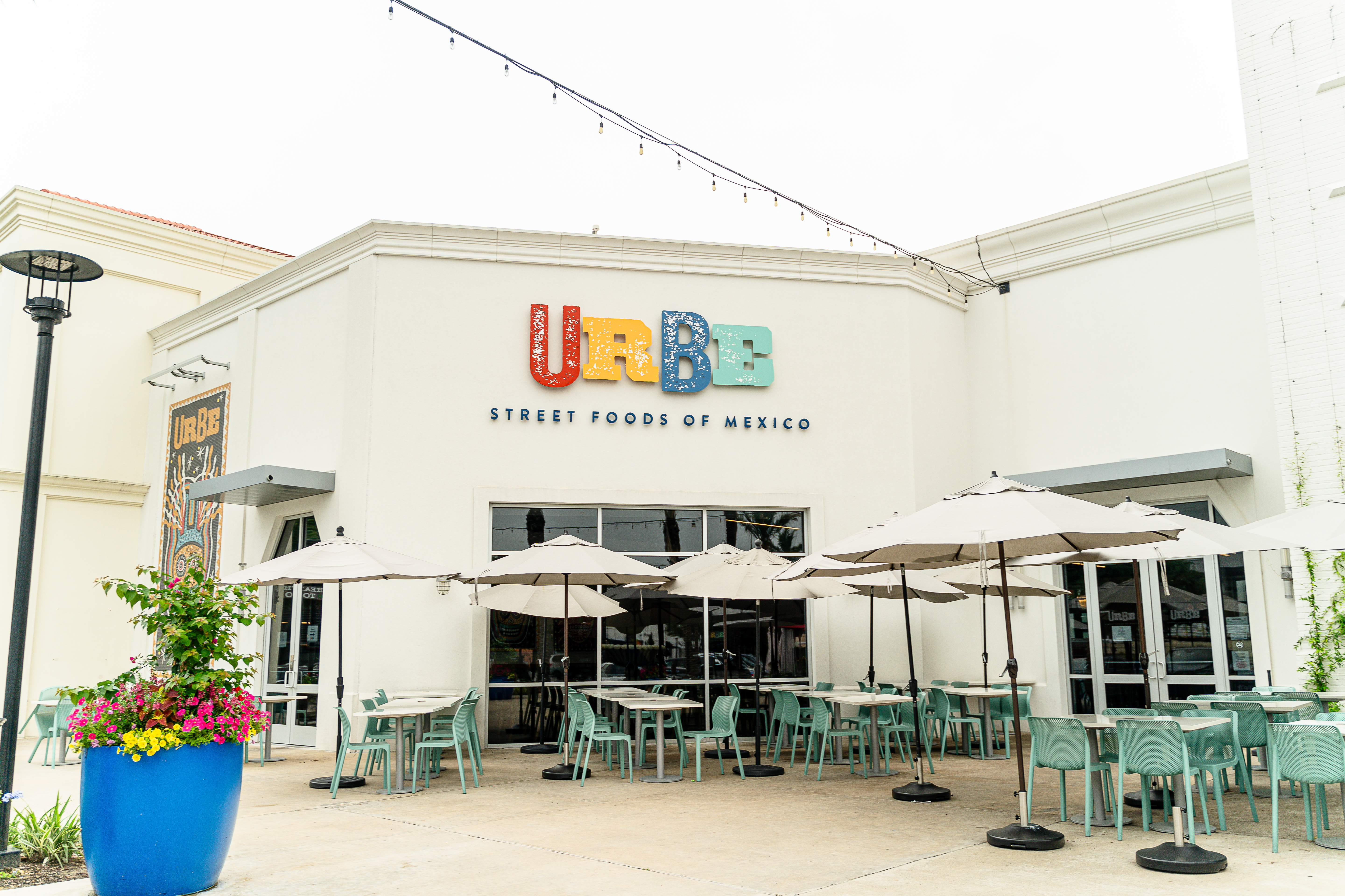 a chair sitting in front of a building