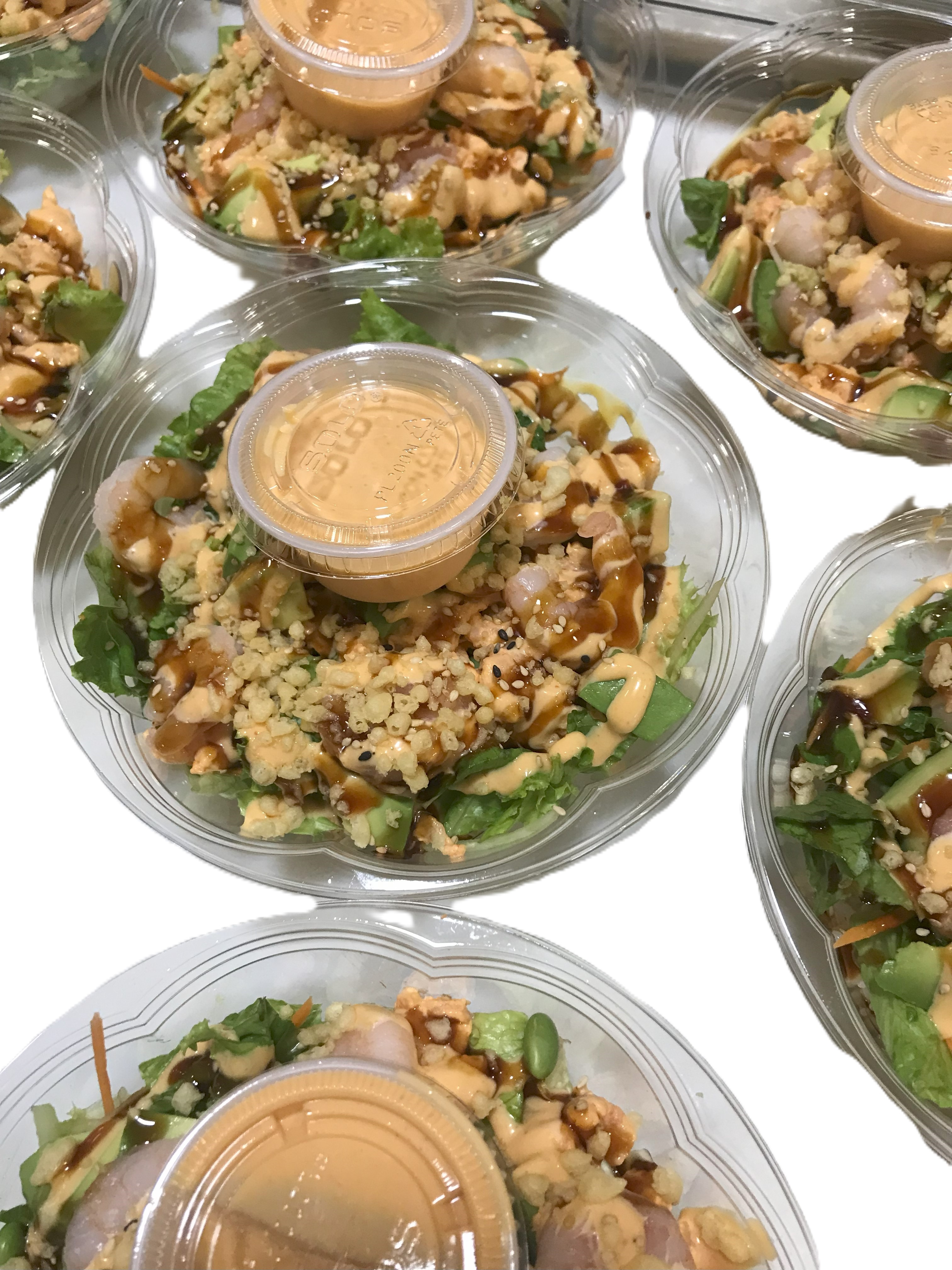 a dish is filled with different types of food on a table