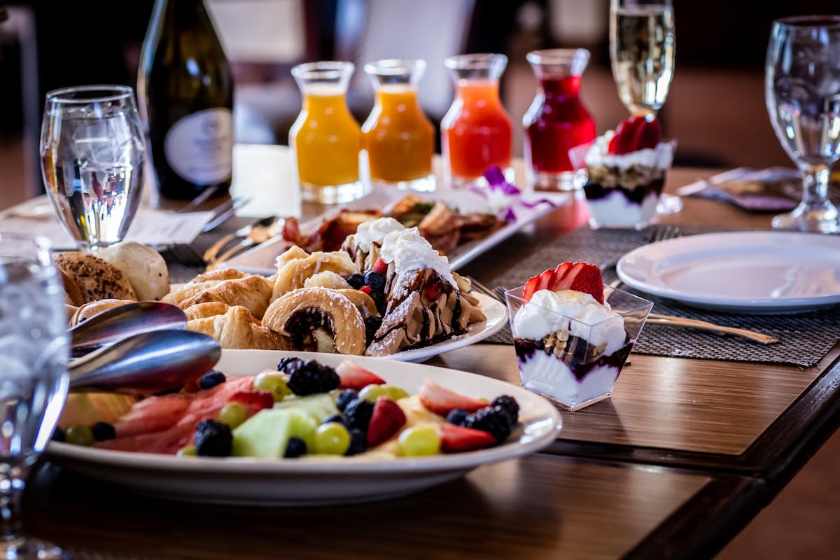a table topped with plates of food on a plate
