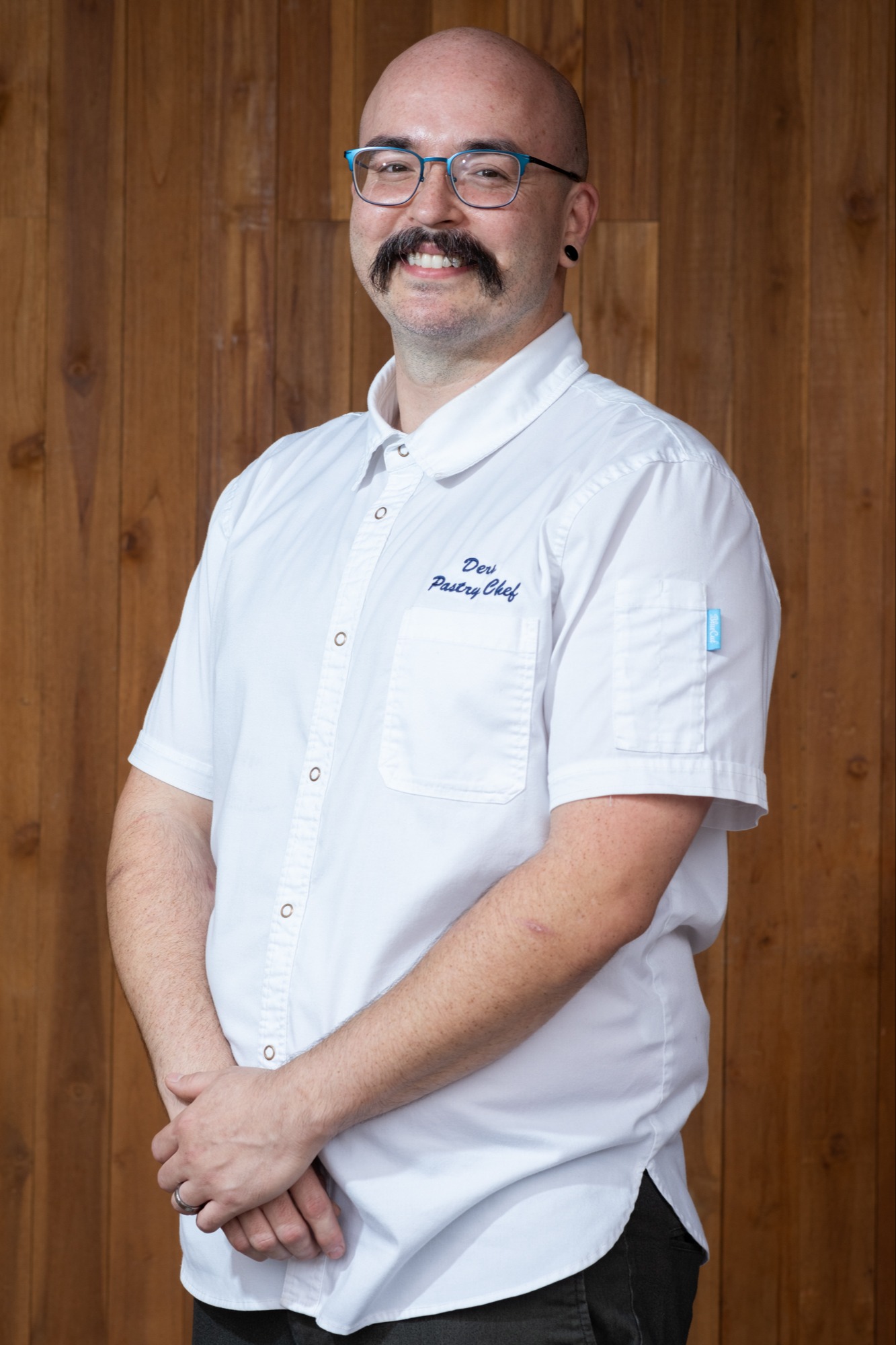a man with a mustache and a mustache