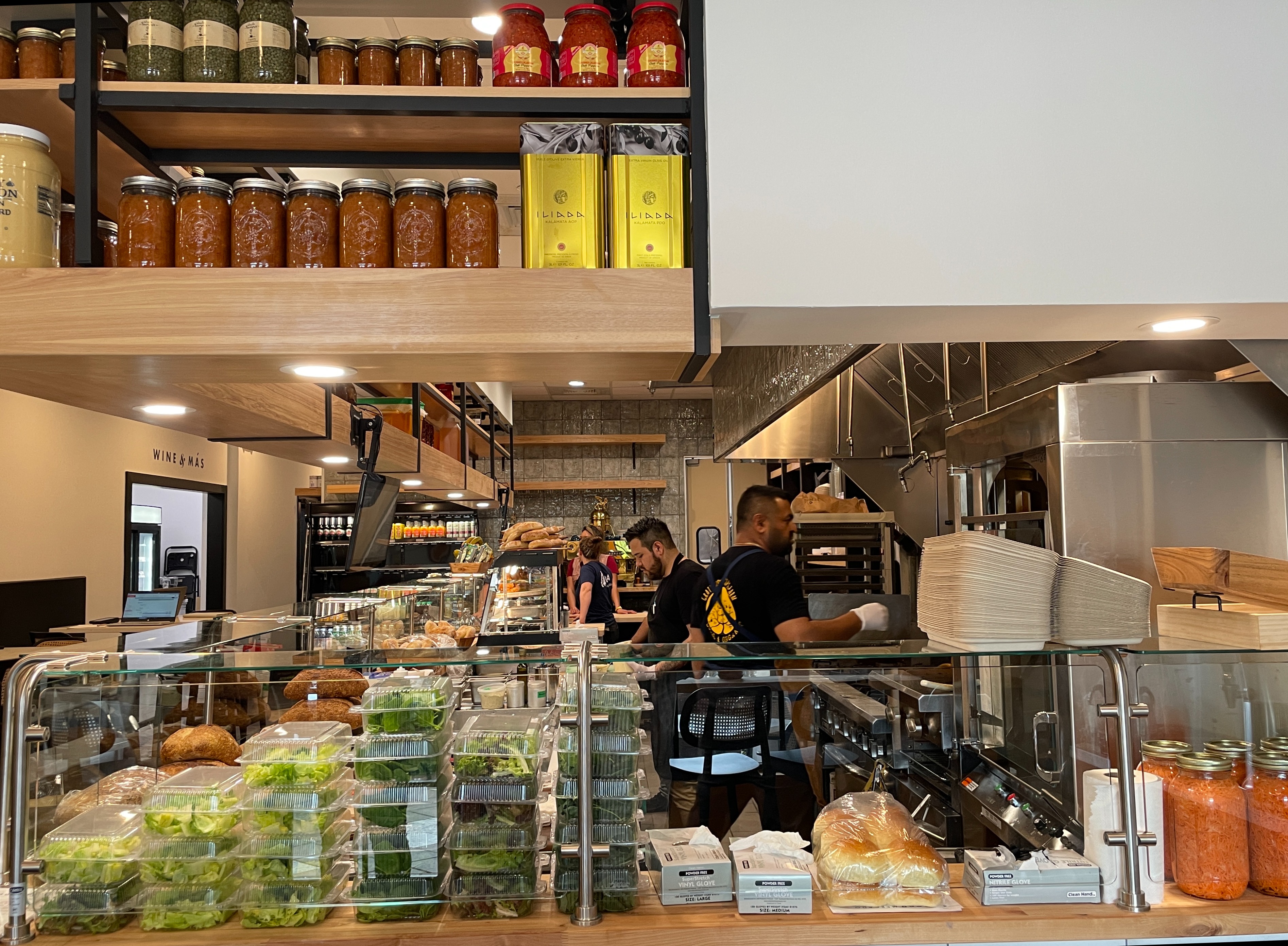 a store filled with lots of food on a counter