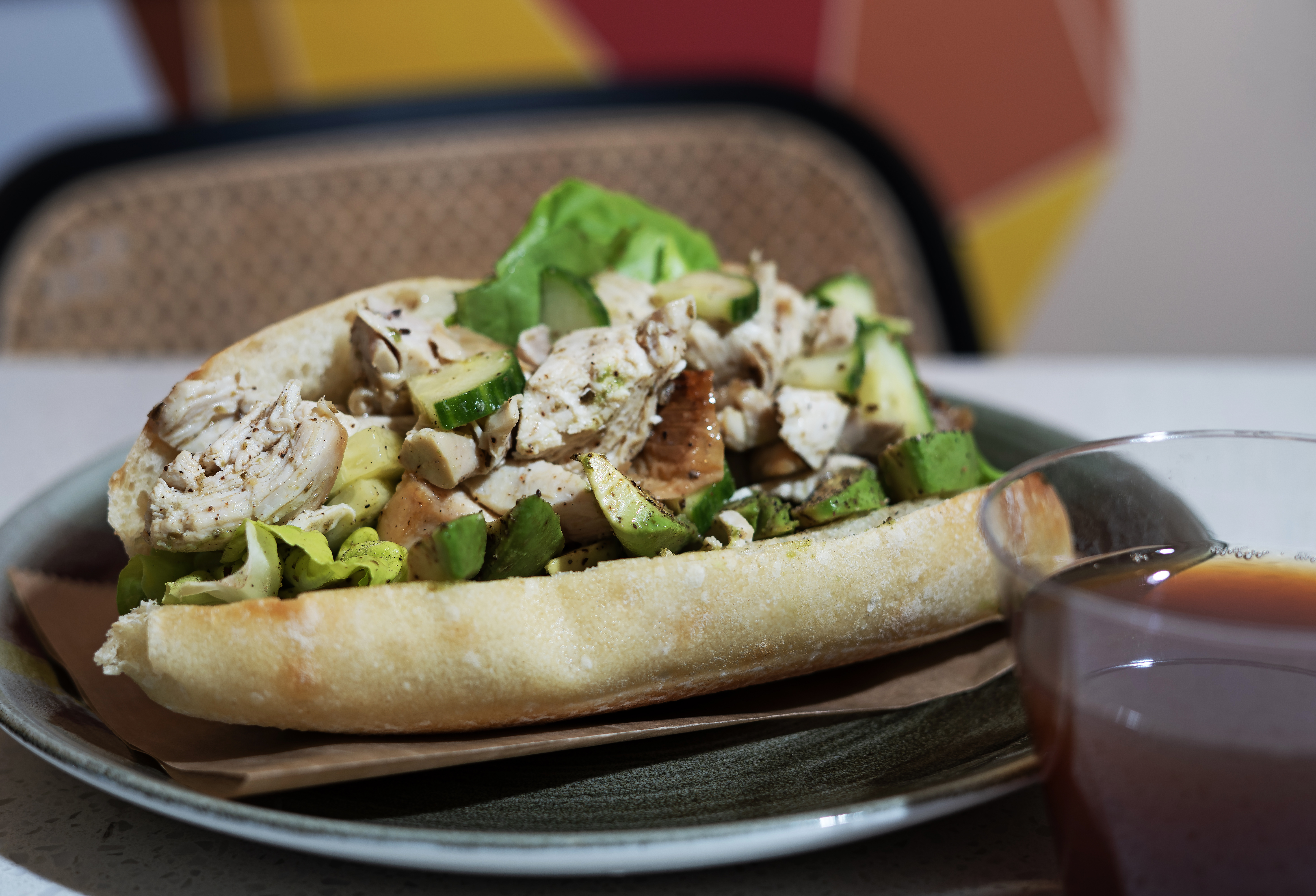 a sandwich sitting on top of a plate of food