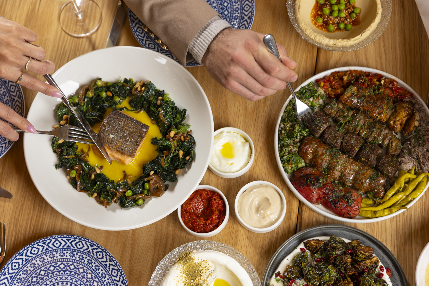 a person eating food on a table