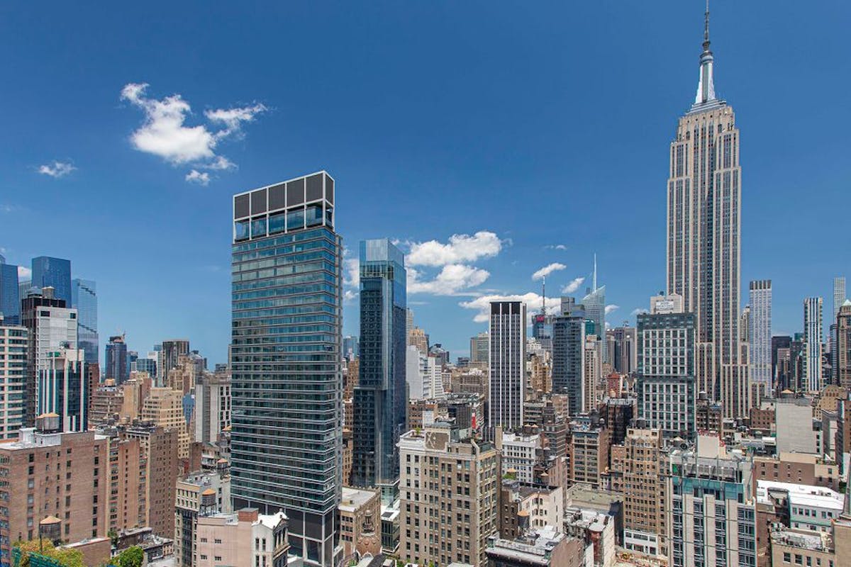 a city with tall buildings in the background