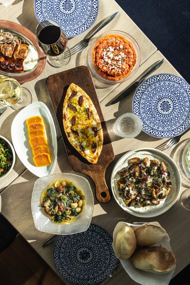 a bunch of different types of food on a table