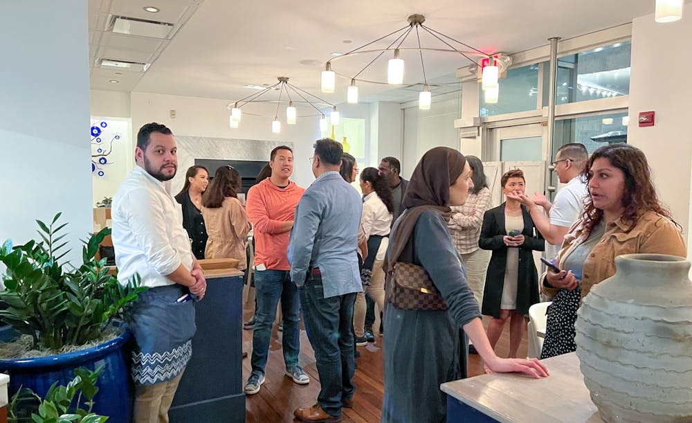a group of people standing in a room