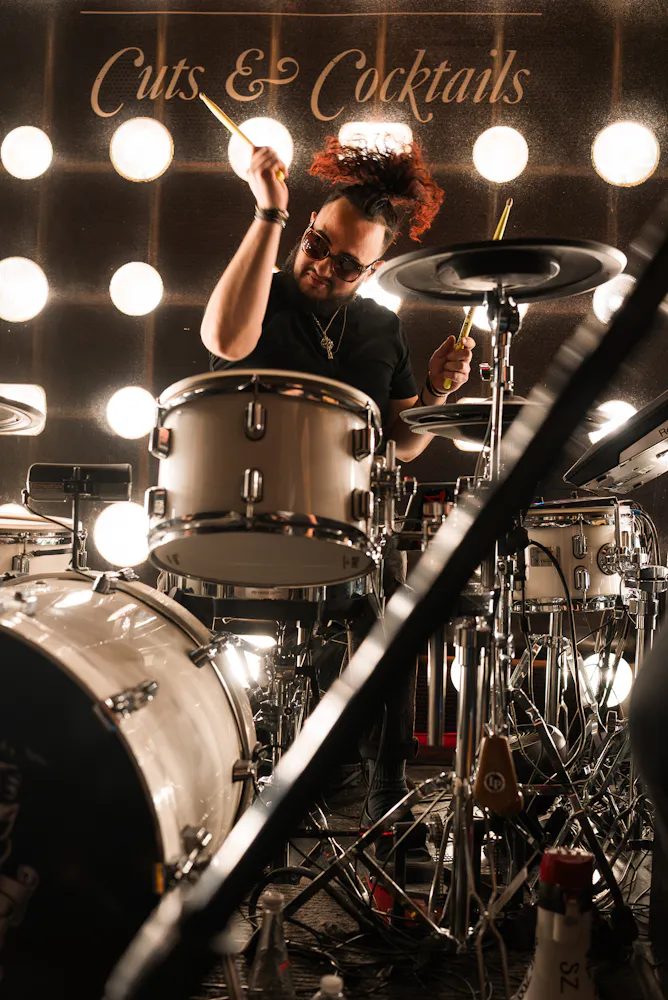 Drummer playing live music at Las Vegas speakeasy.
