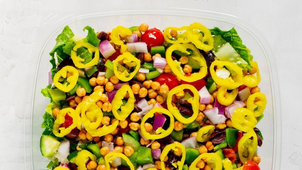 a bowl of fruit and vegetable salad