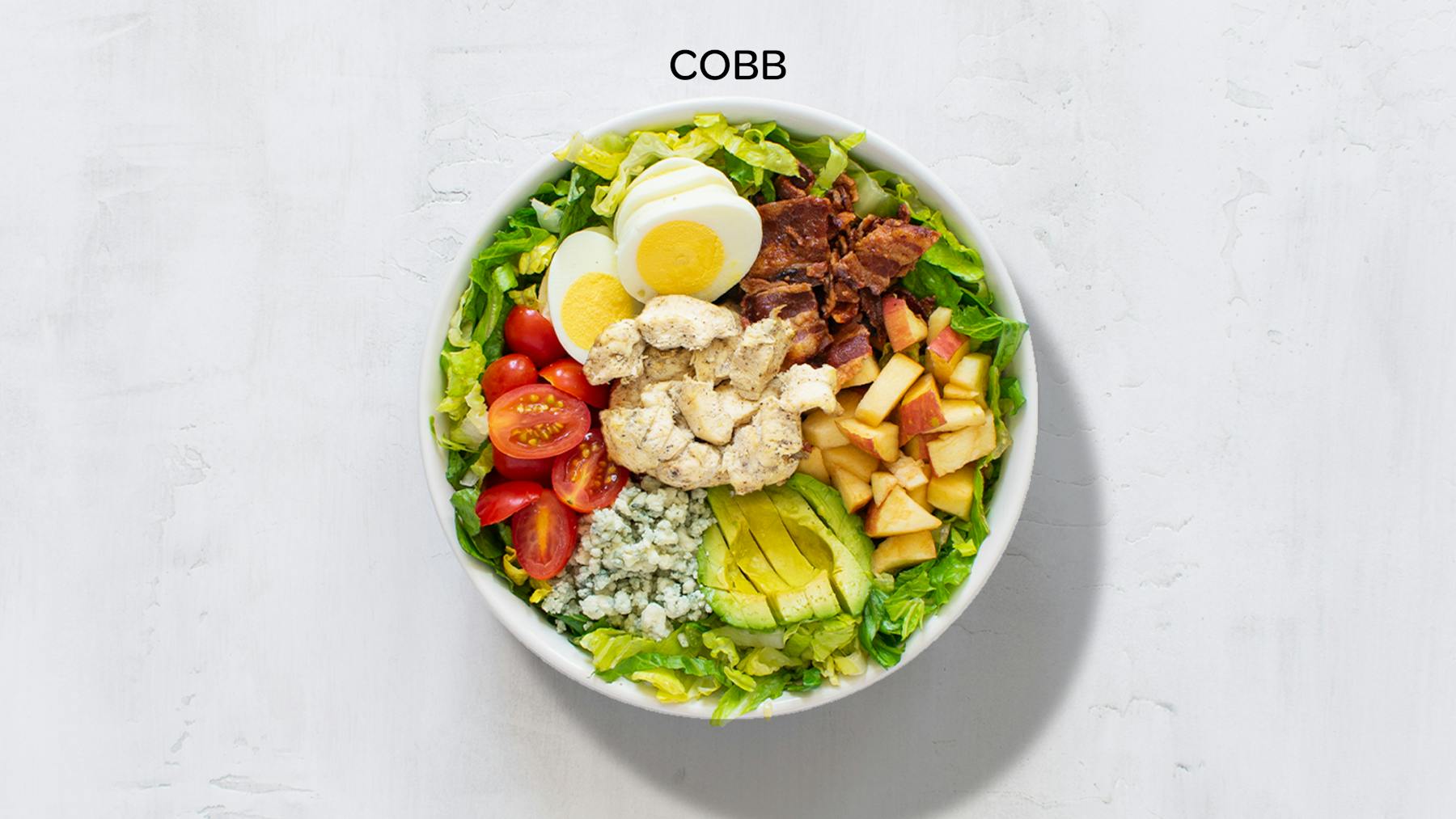 a bowl of Cobb salad