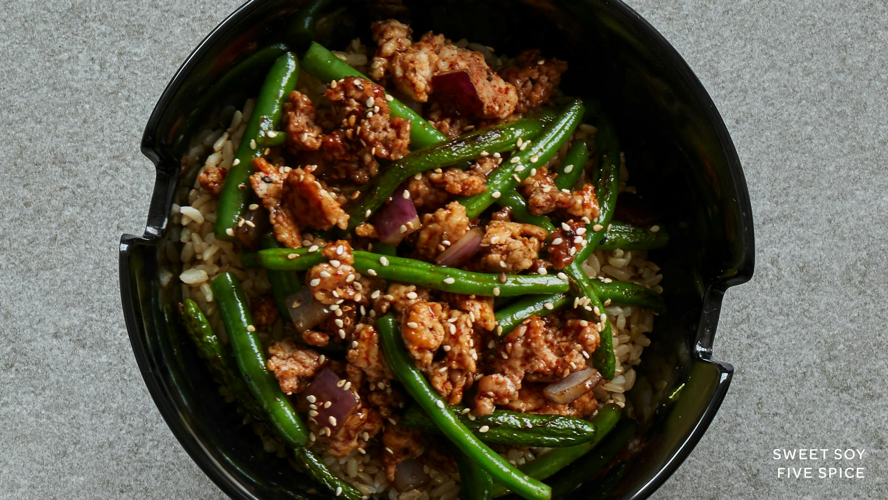 a bowl of food with broccoli