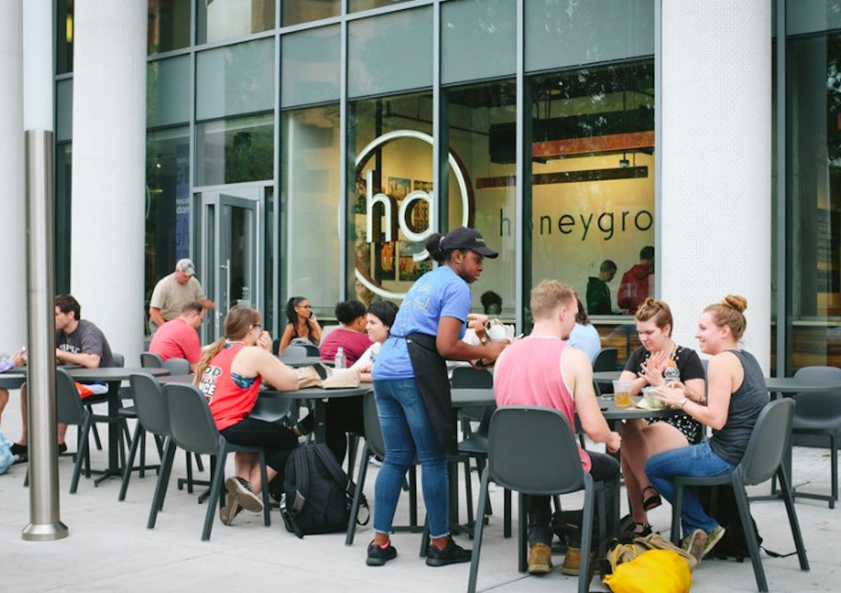 several people eating and chatting