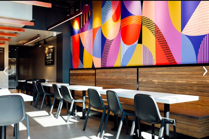 a room filled with dining furniture