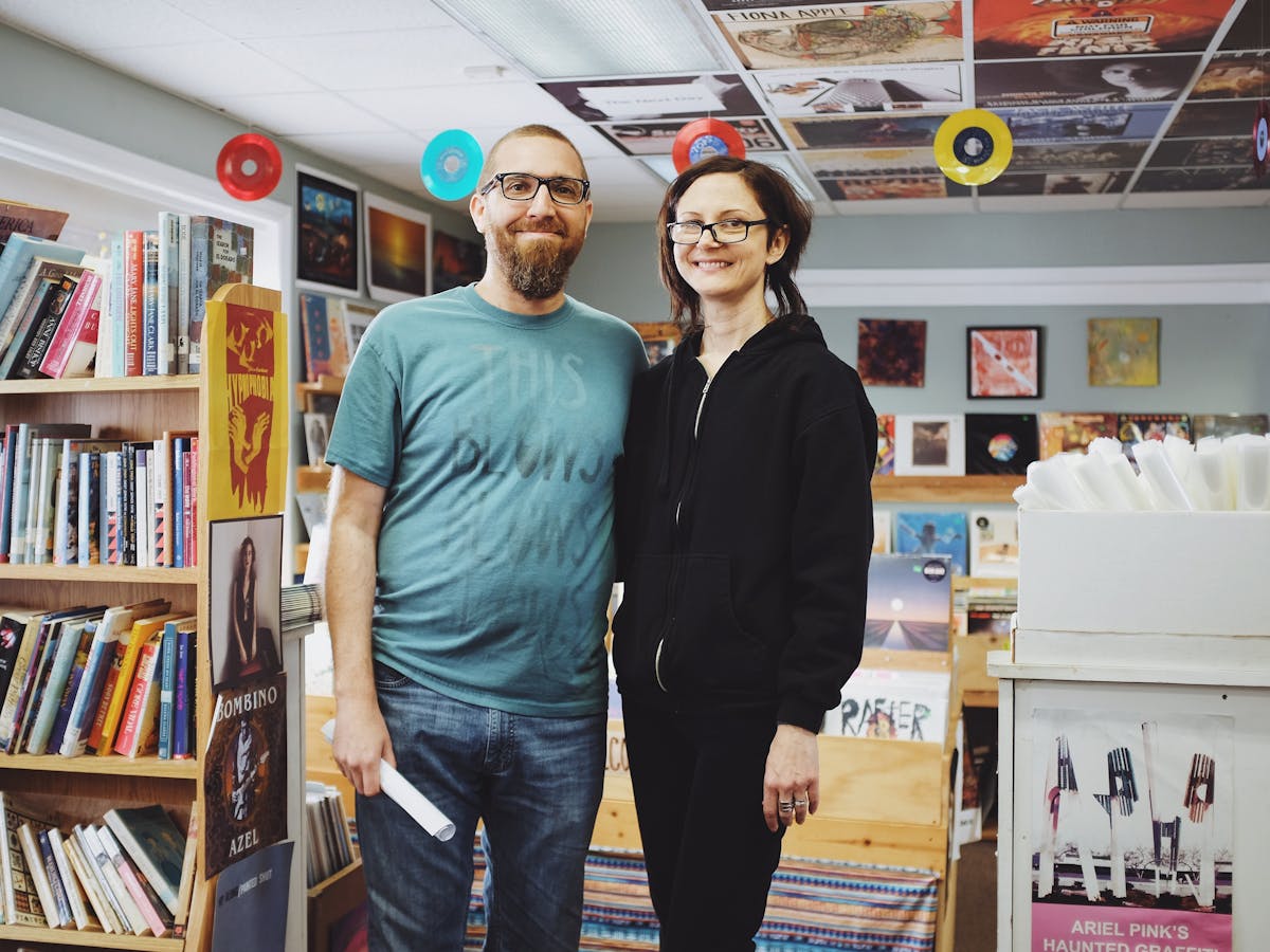 two people posing for the camera