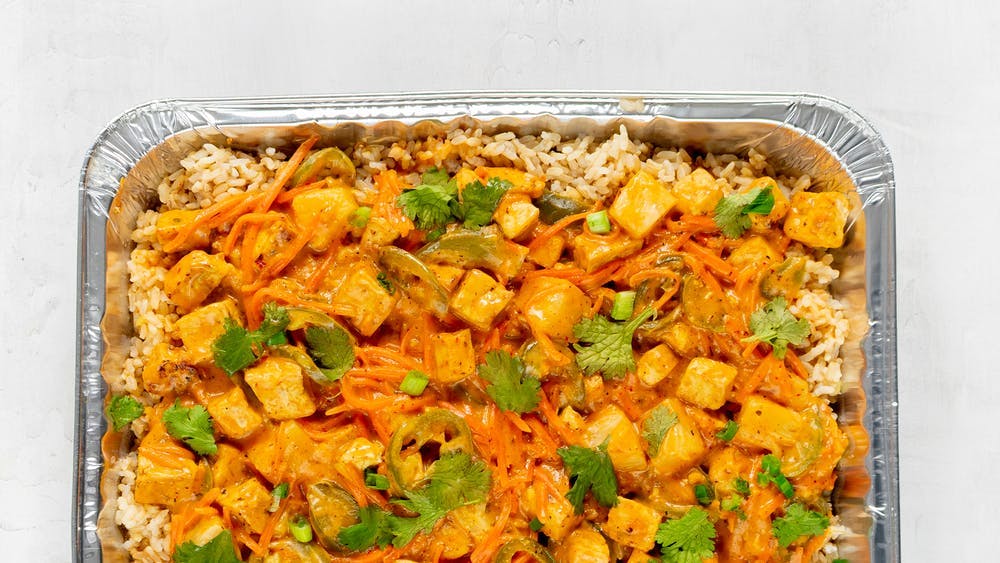 a dish is filled with food