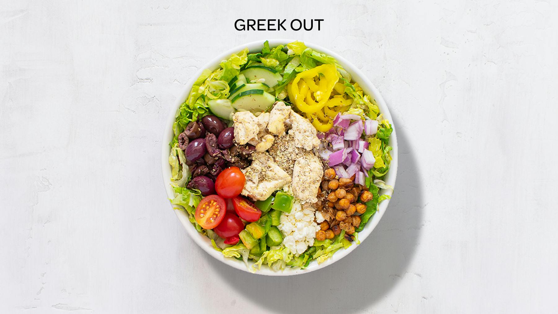 a bowl of greek out salad