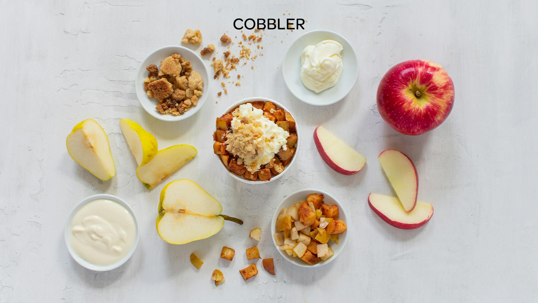 the ingredients of a cobbler honeybar spread out on a table