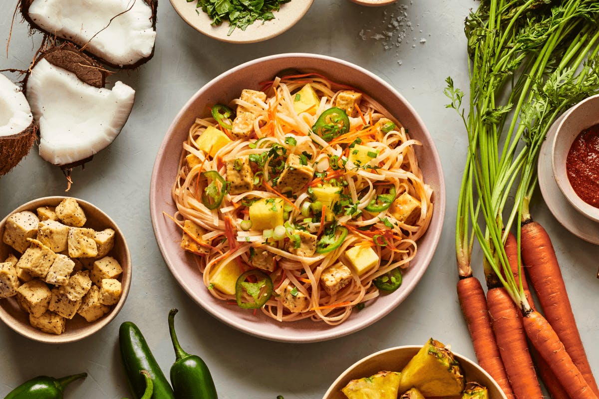 a bowl filled with different types of food on a table