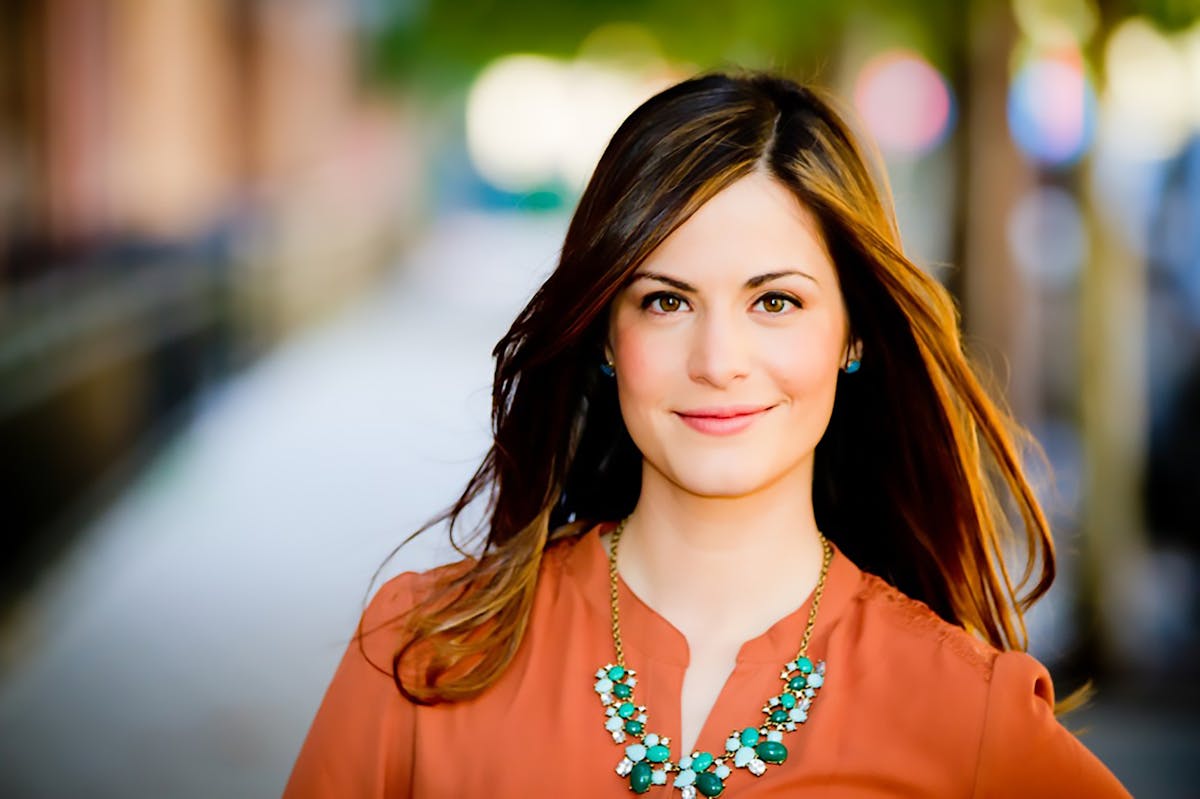 a woman smiling for the camera