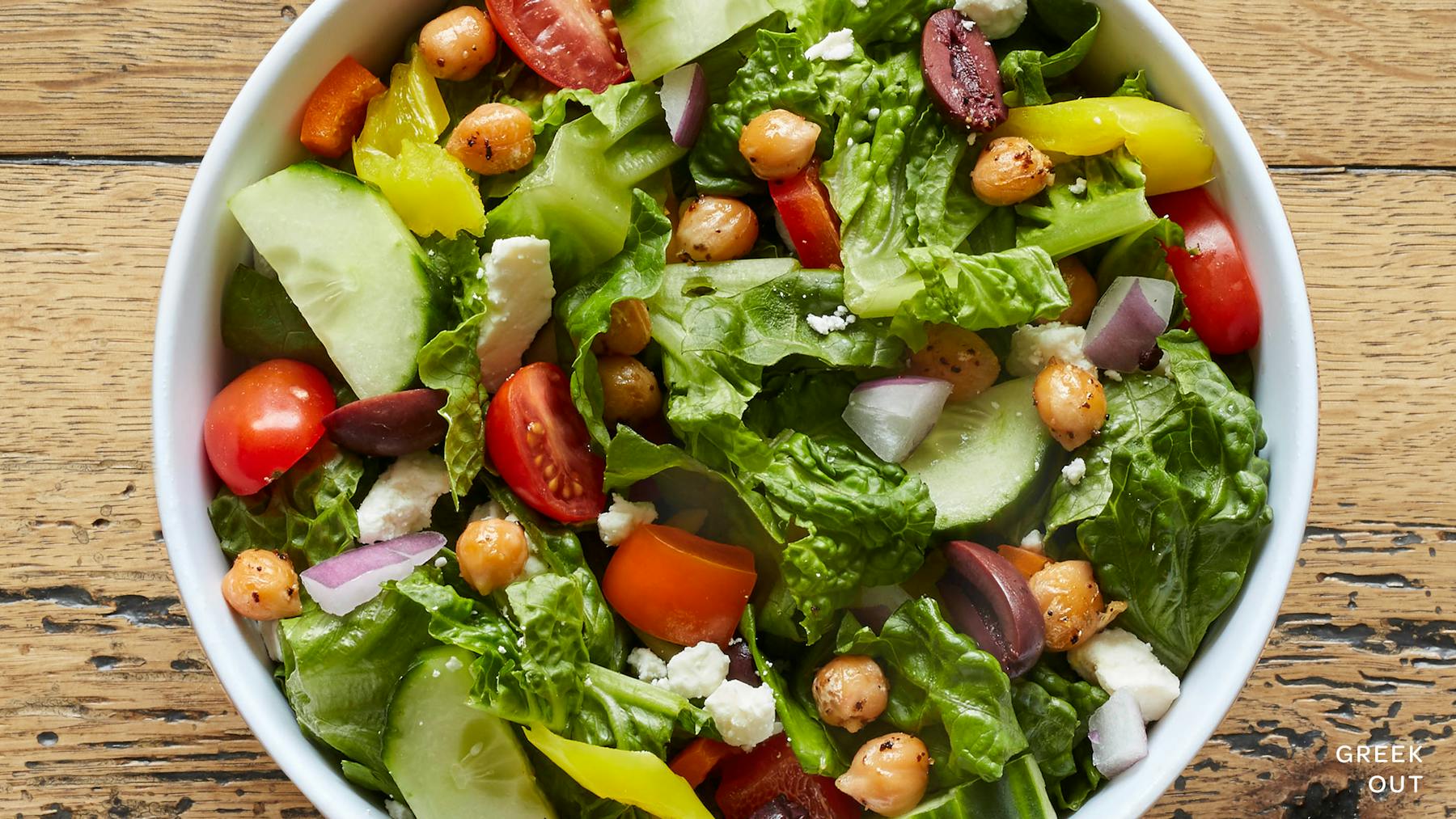 a bowl of fruit salad on a plate