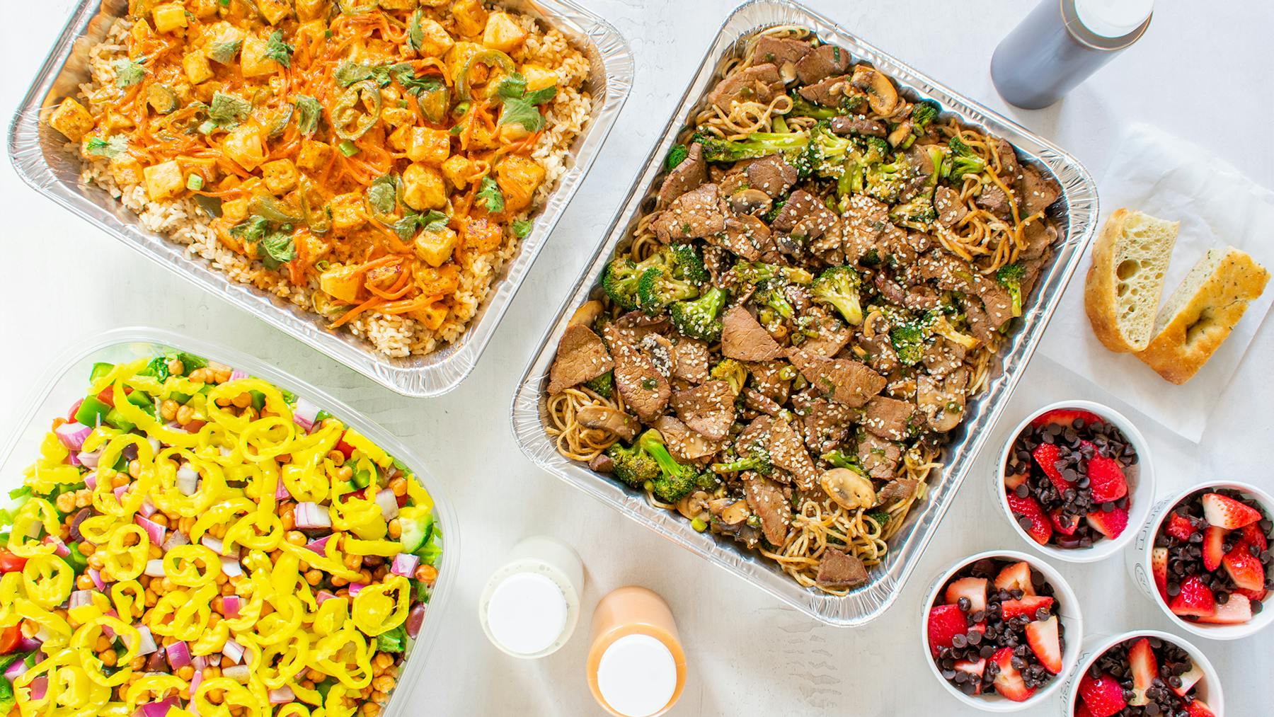 a bowl filled with different types of food on a table