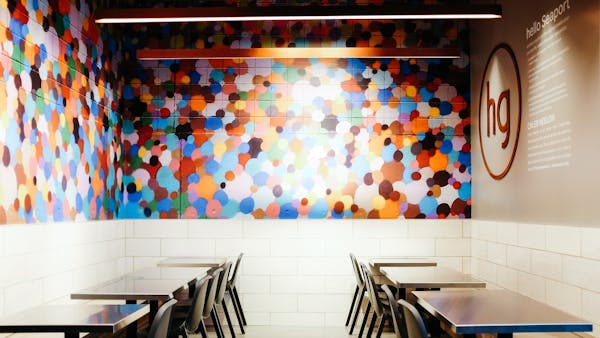 a room filled with dining tables
