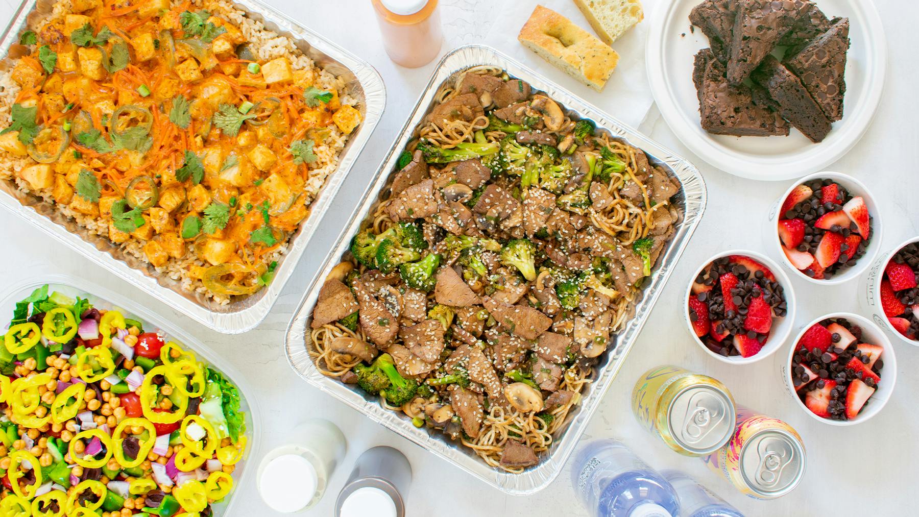a bowl filled with different types of food on a table