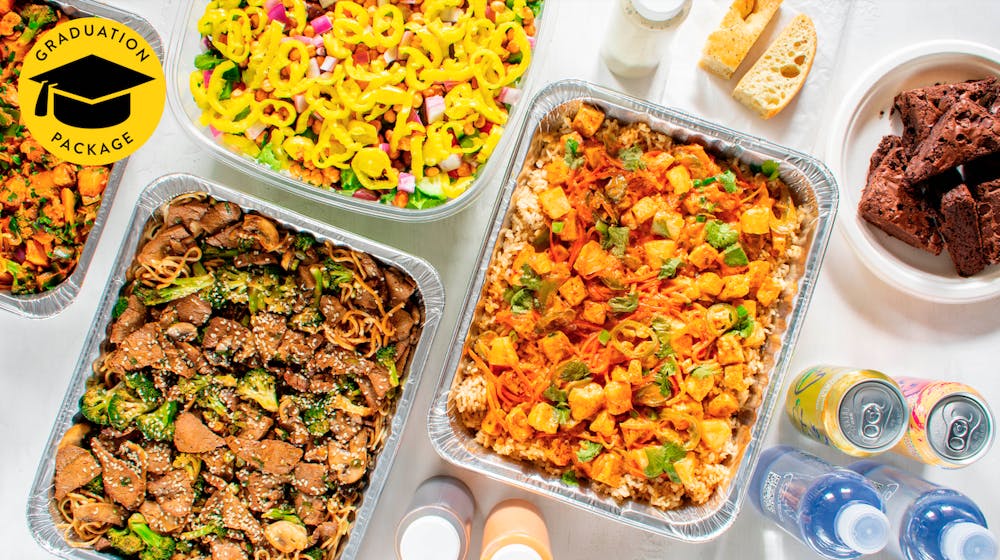 a box filled with different types of food on a table