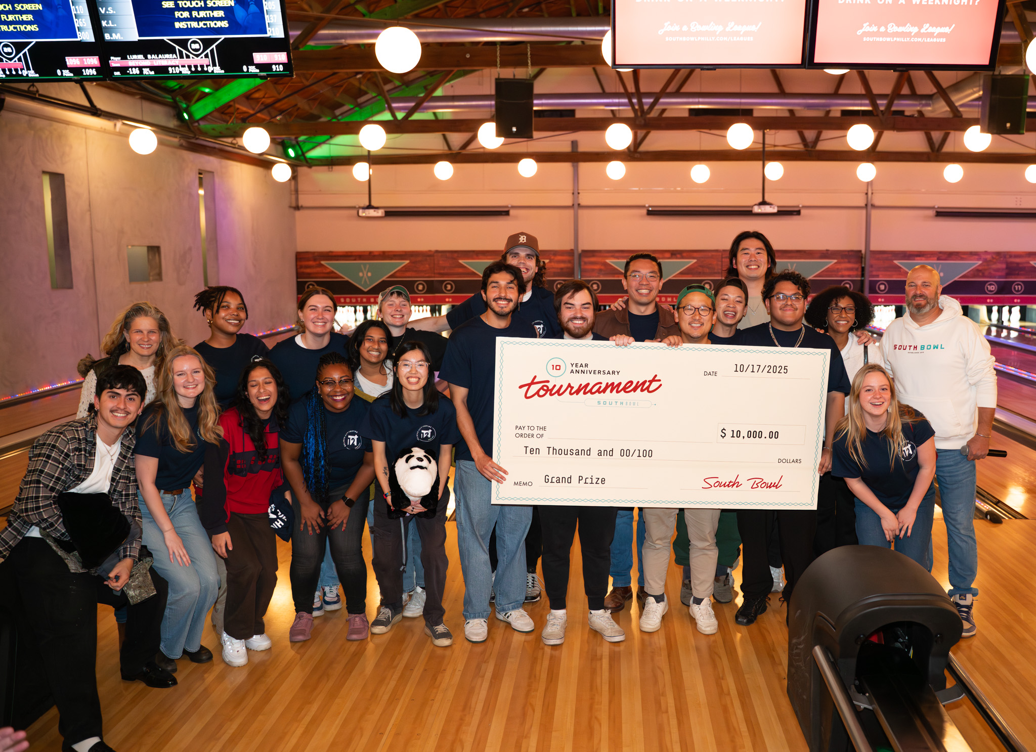 a group of people posing for the camera