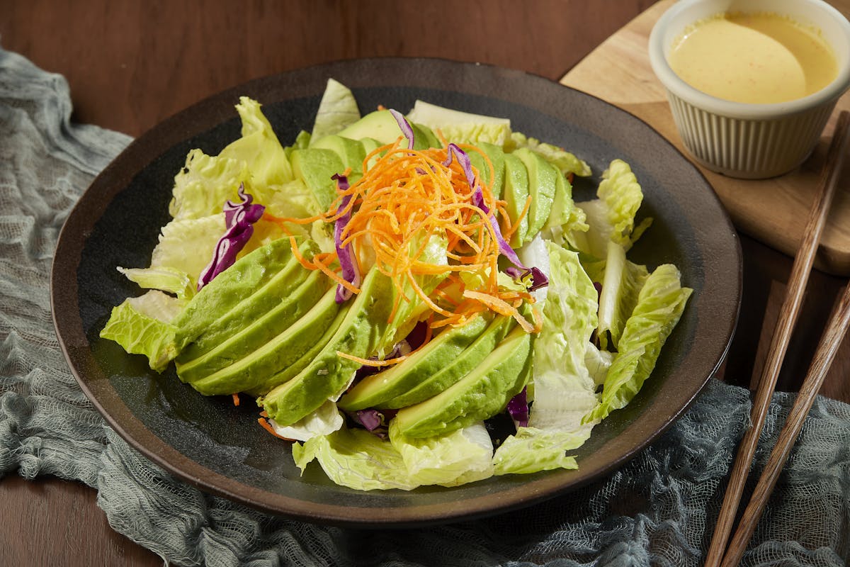 a bowl of food sitting on a table