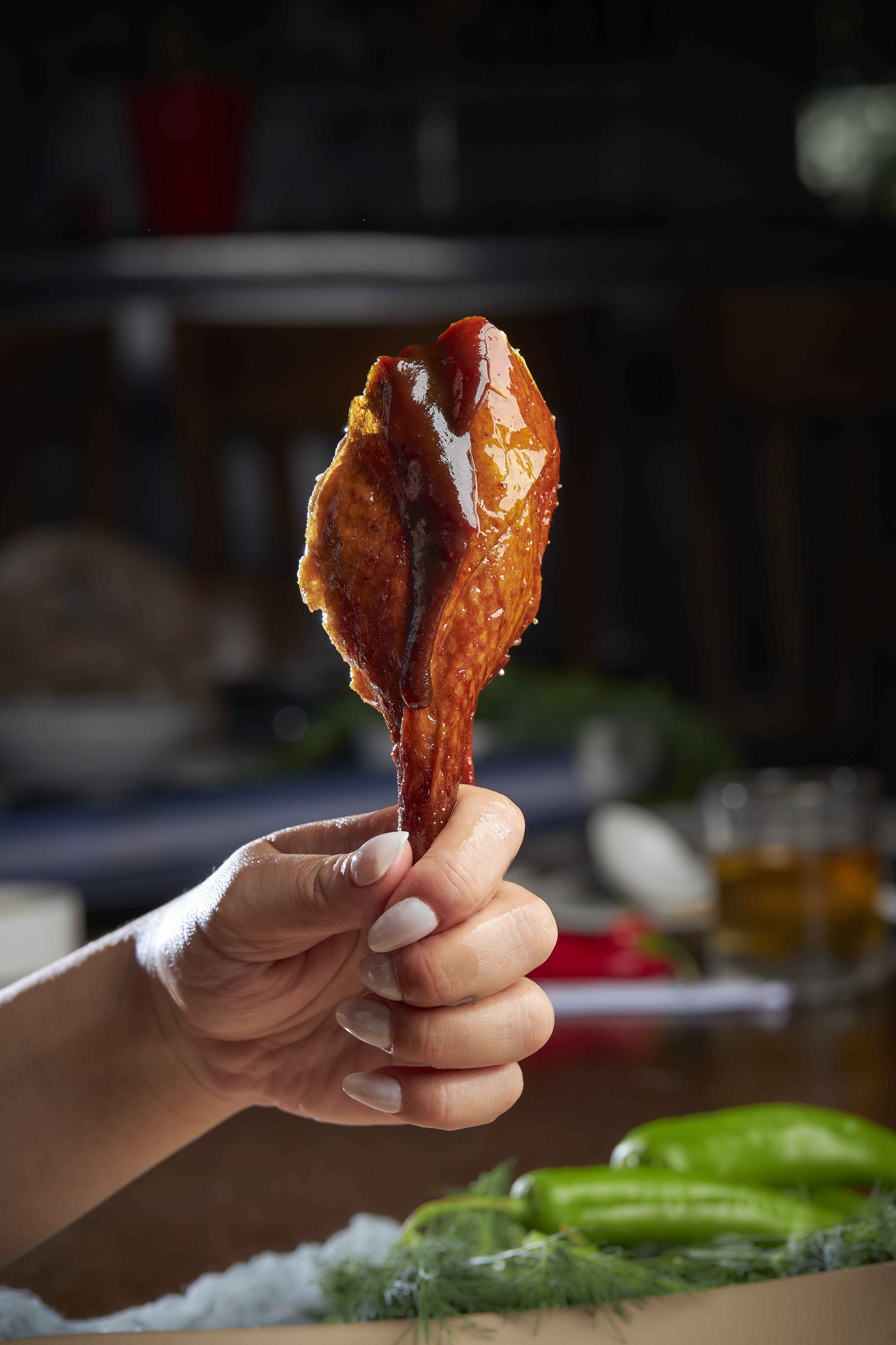 a close up of a person holding a piece of food