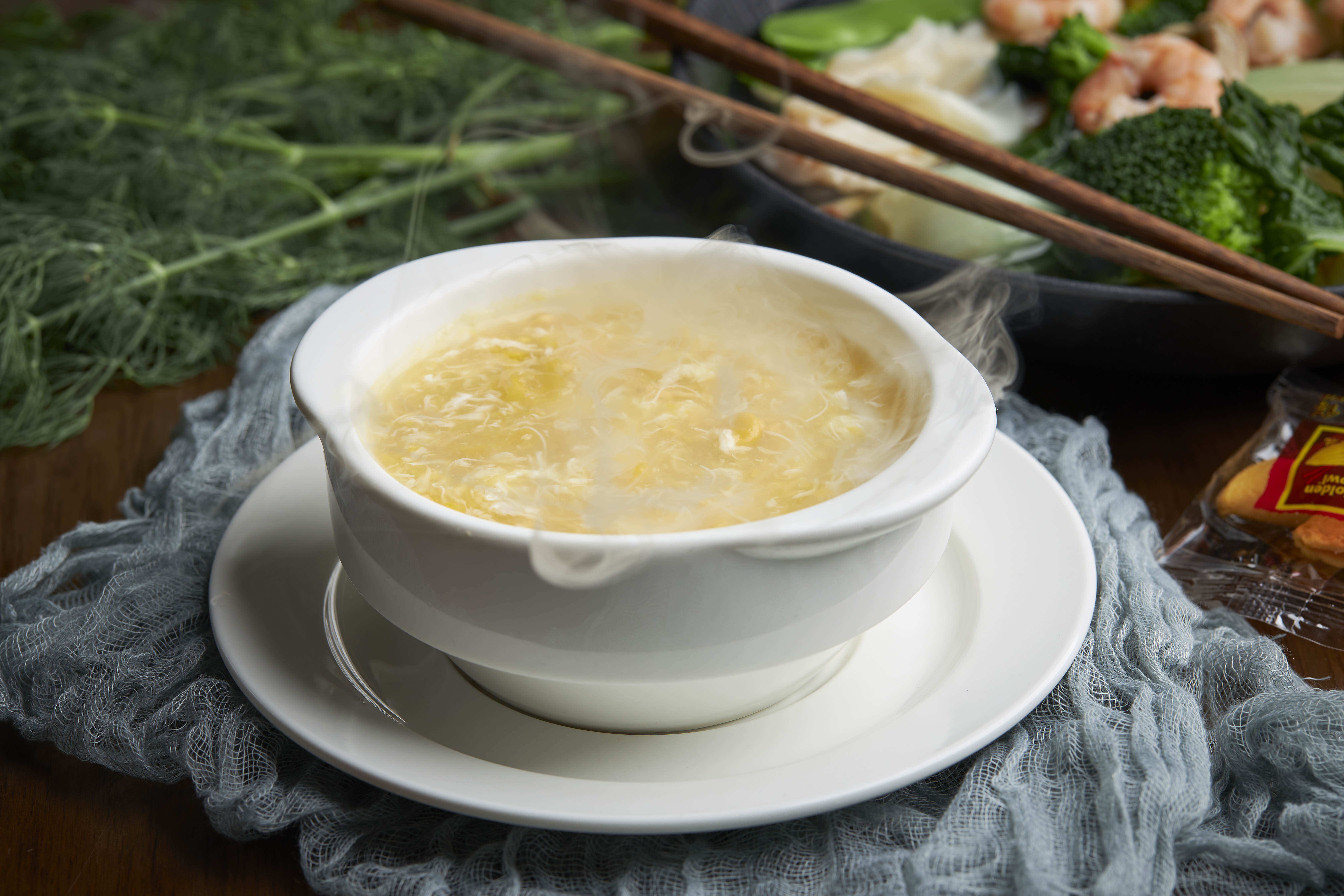 a plate of food and a cup of coffee