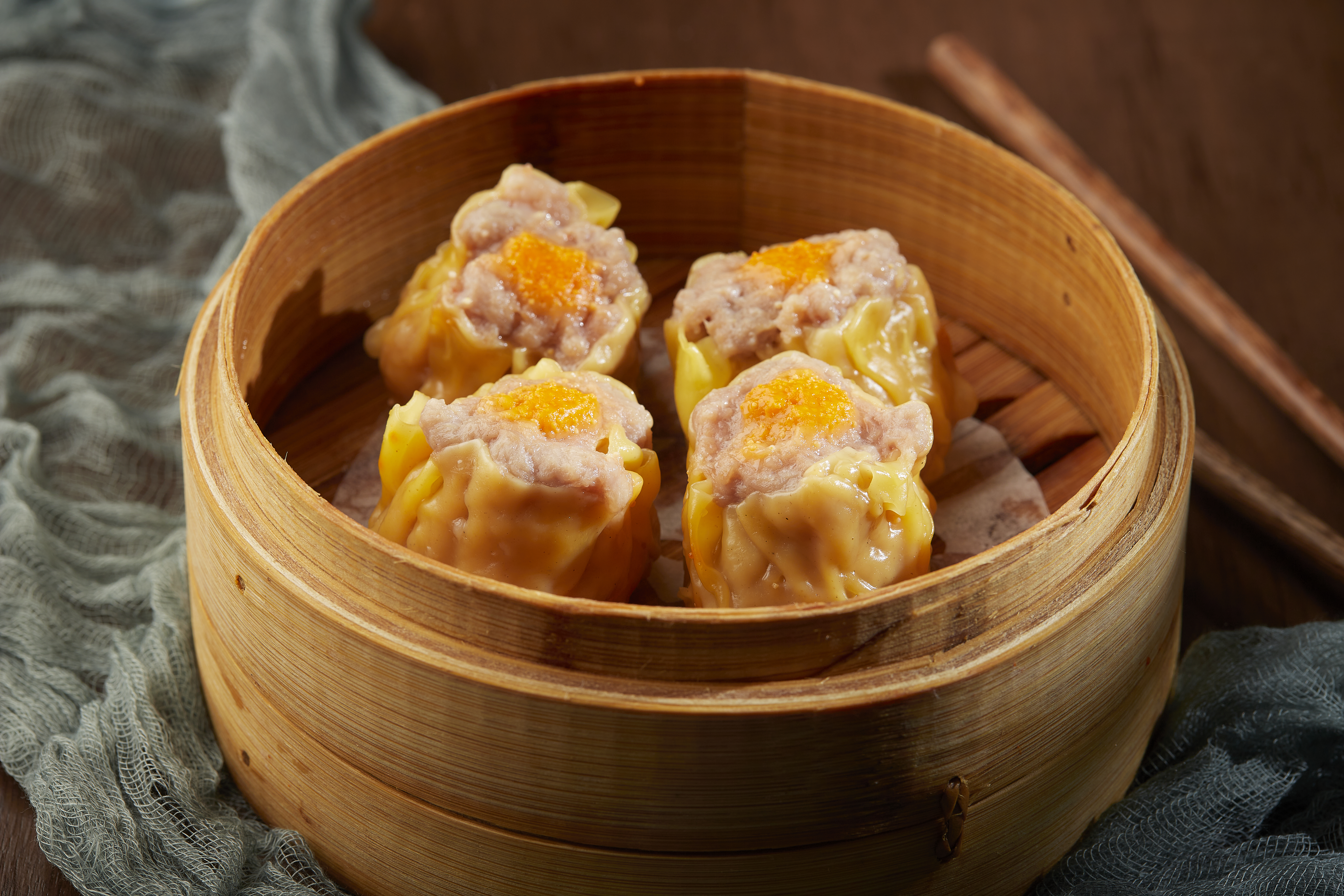 a bowl of food sitting on a table