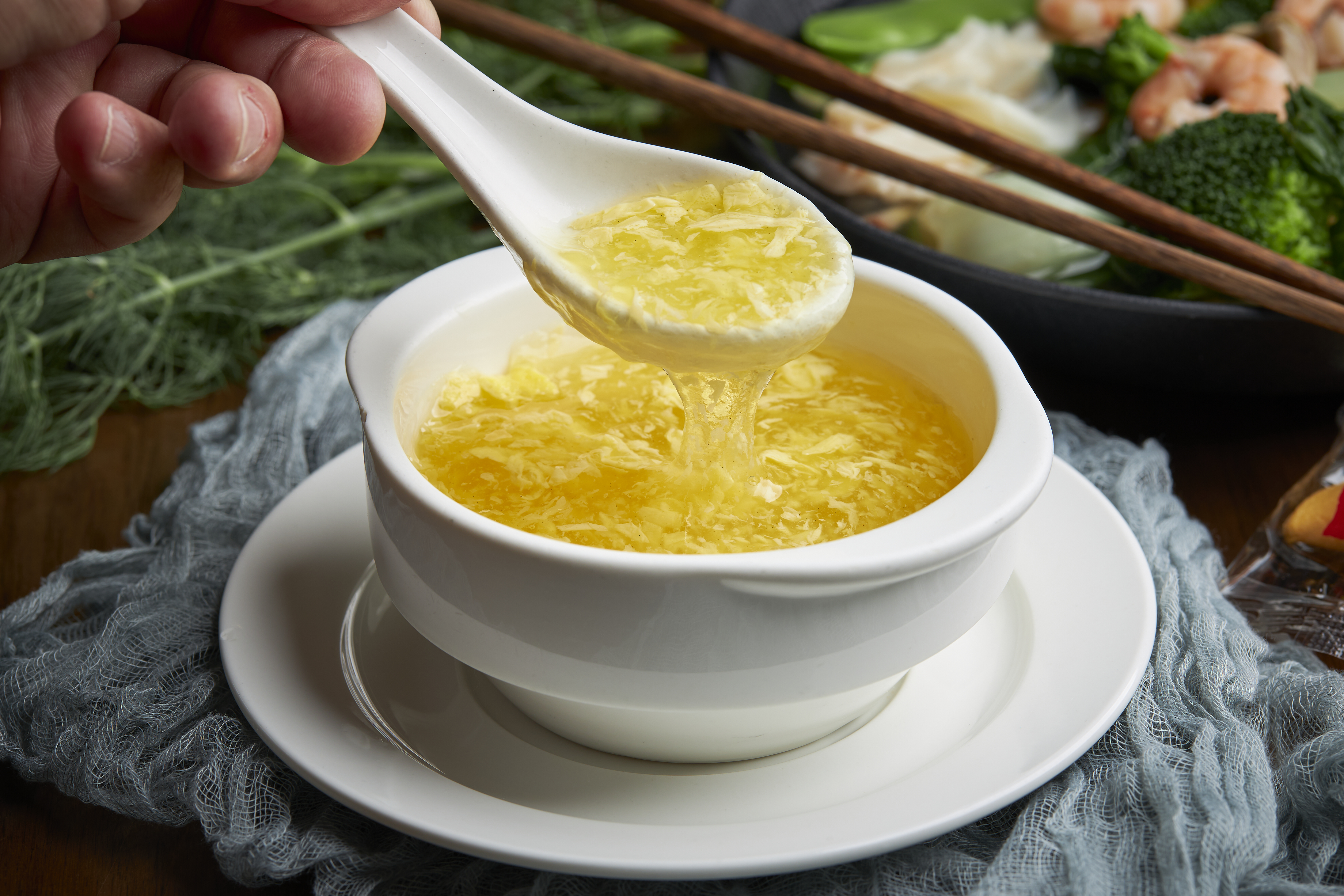 a plate of food and a cup of coffee