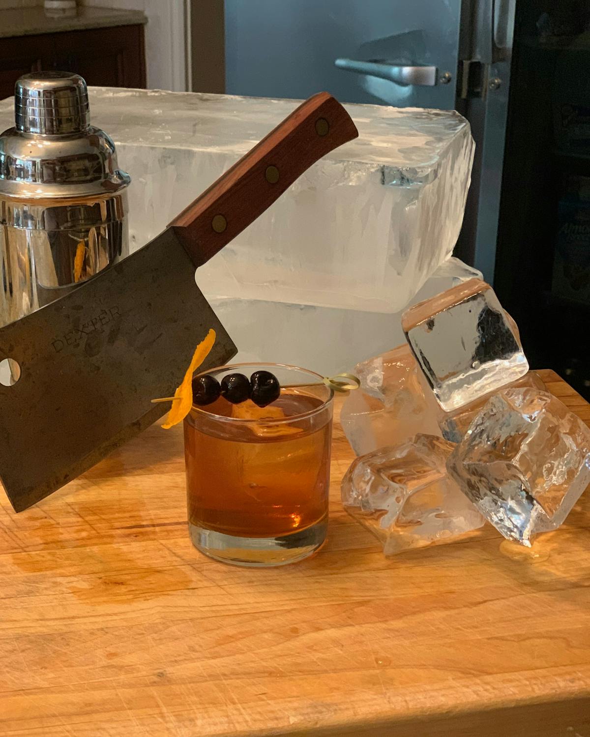 a butcher's knife with a drink