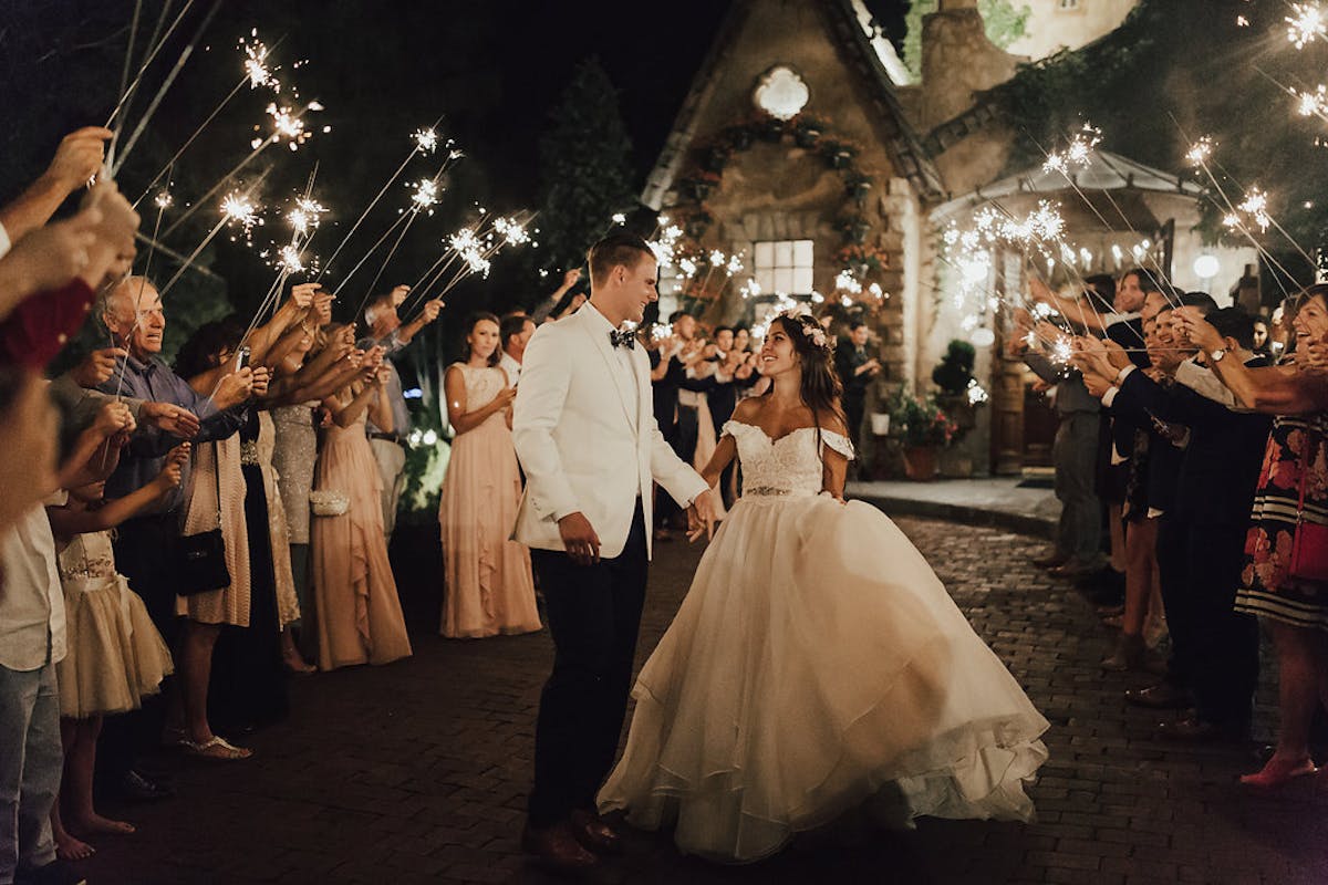 the bride and groom dancing