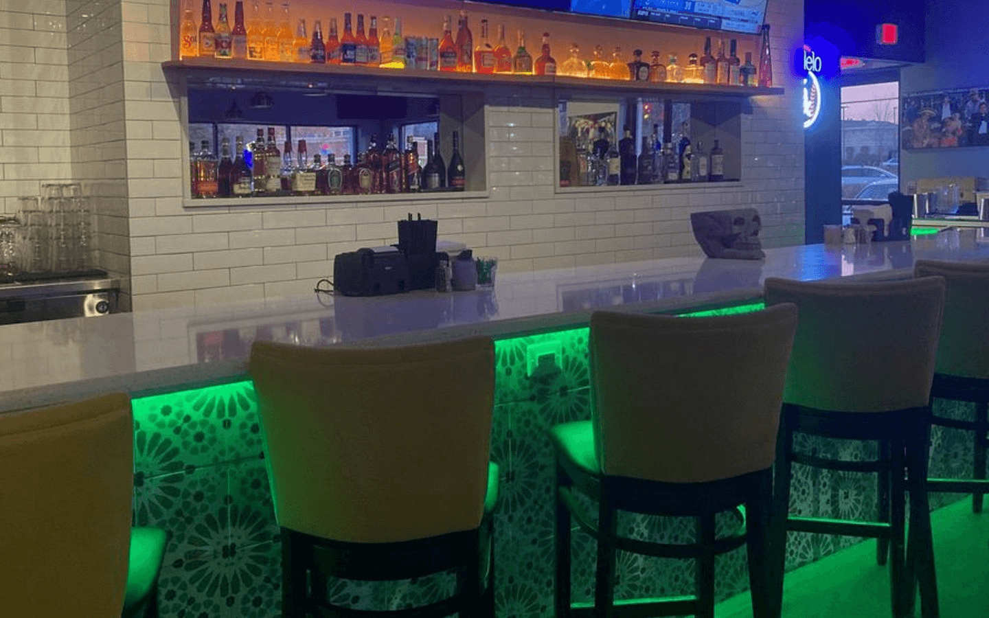 a person sitting at a table in a restaurant