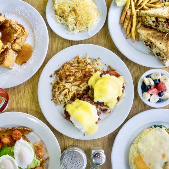 a table topped with different types of food on a plate