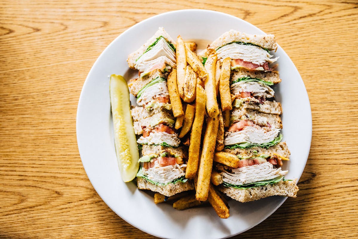 a sandwich cut in half on a plate