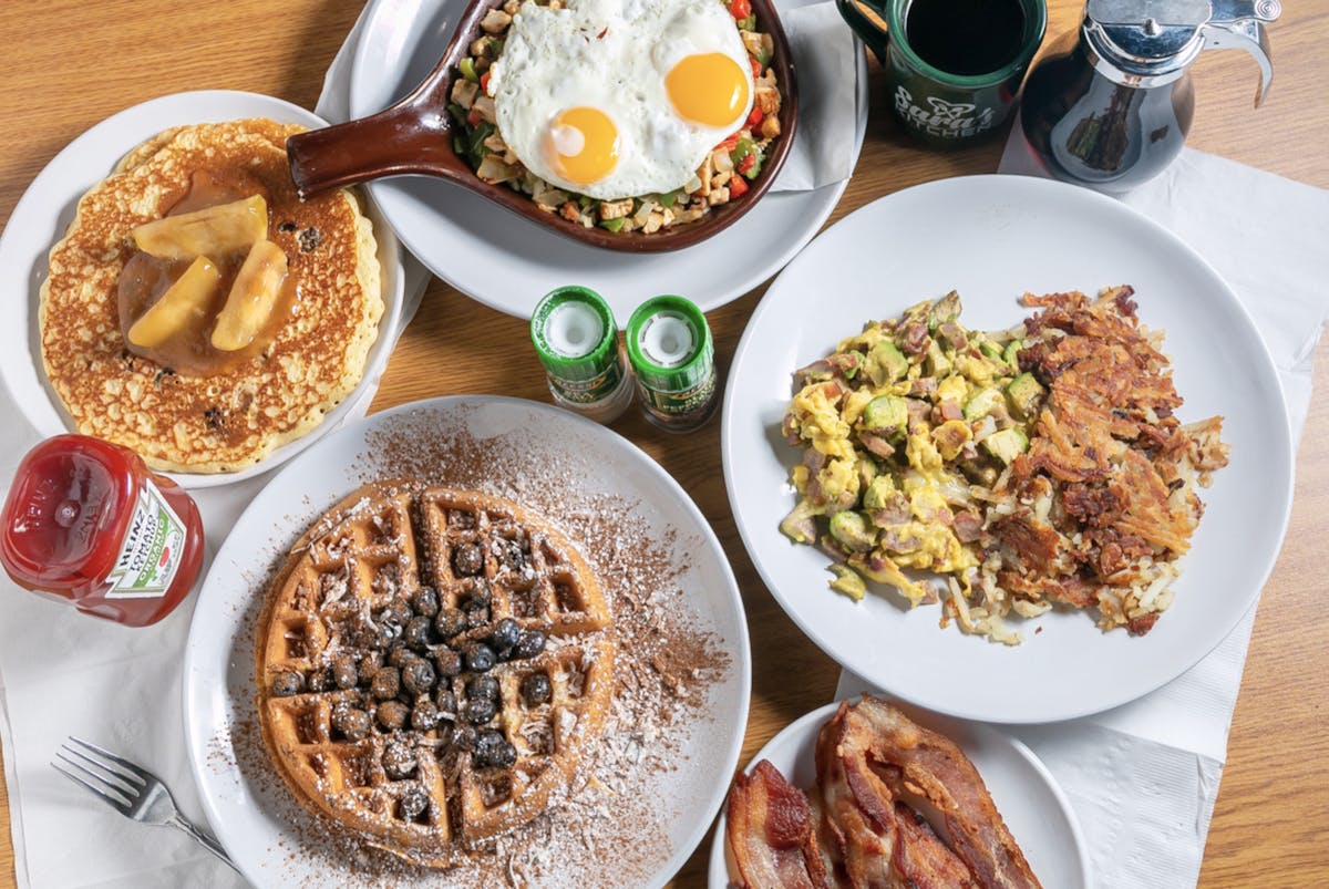 a table topped with different types of food on a plate