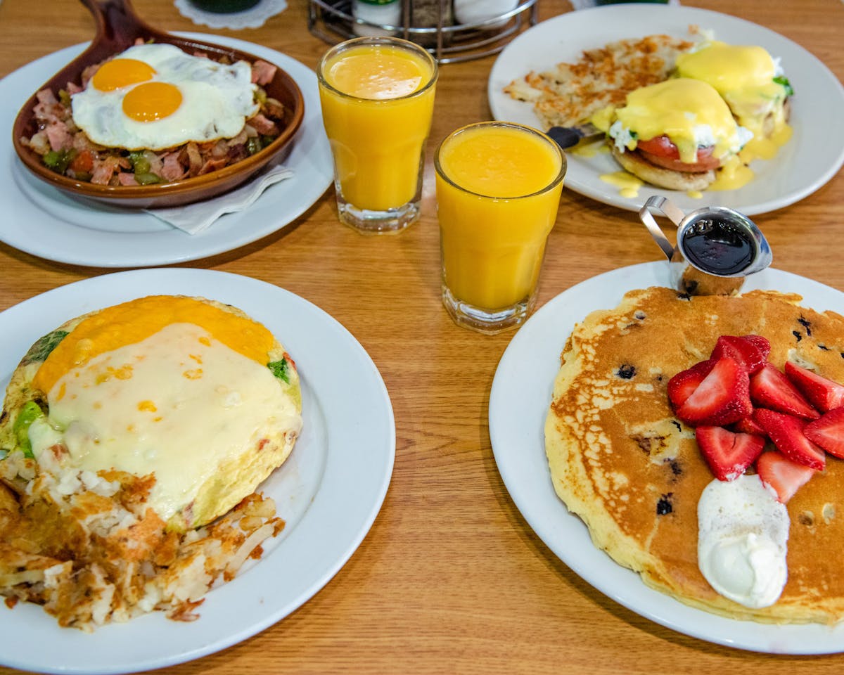 a table topped with plates of food on a plate