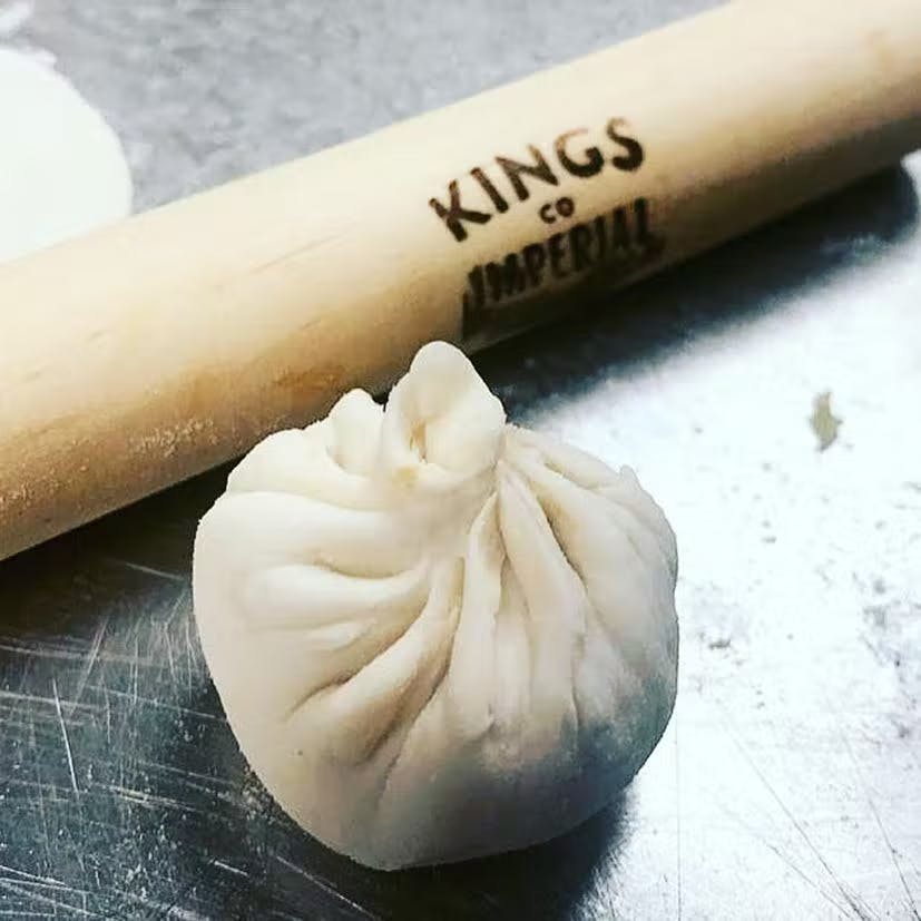 dumpling next to rolling pin