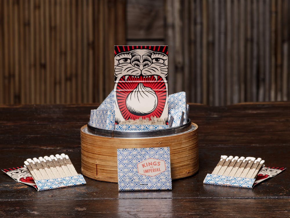 a cake sitting on top of a wooden table