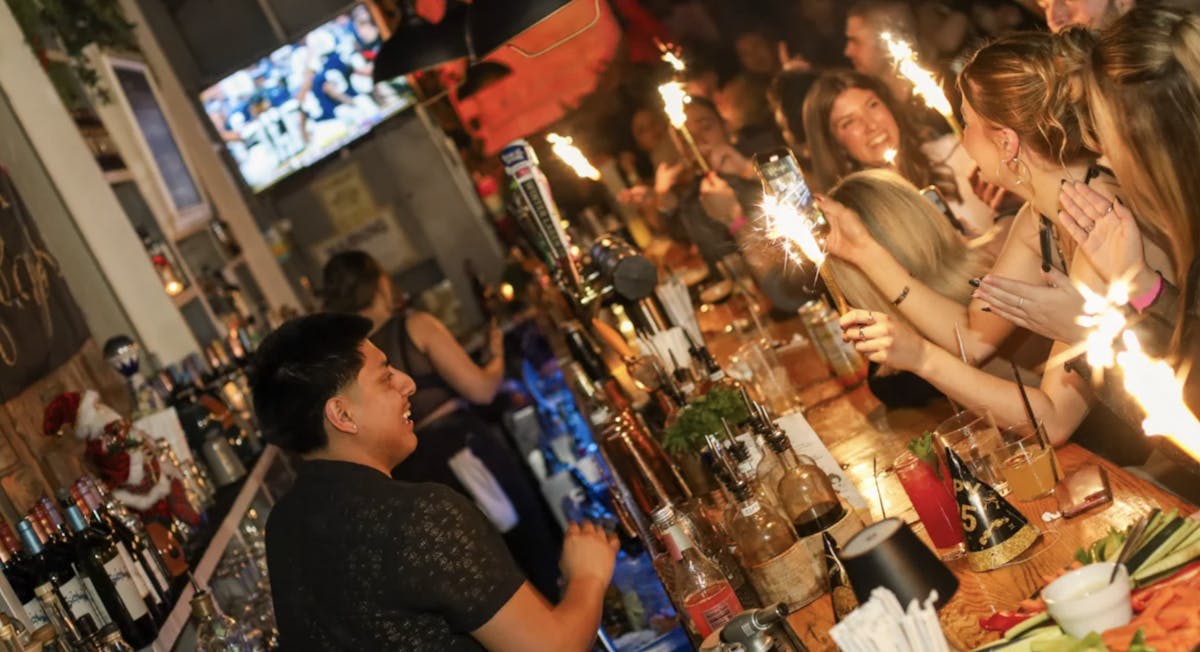Tara Rose bartender shaking cocktails at the Summer Shake-Off in Murray Hill