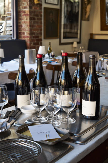 a bottle of wine on a table