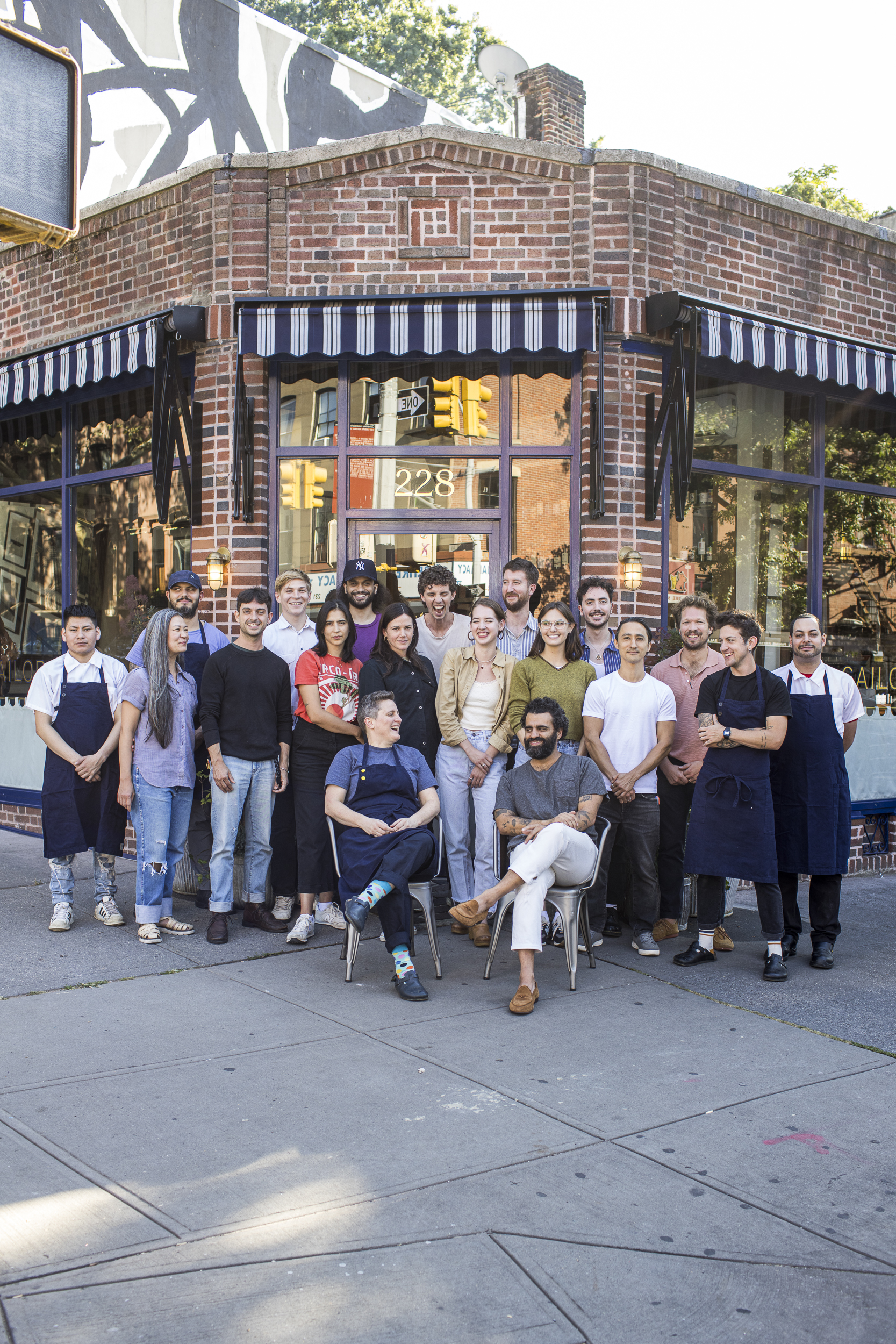 a group of people on a sidewalk