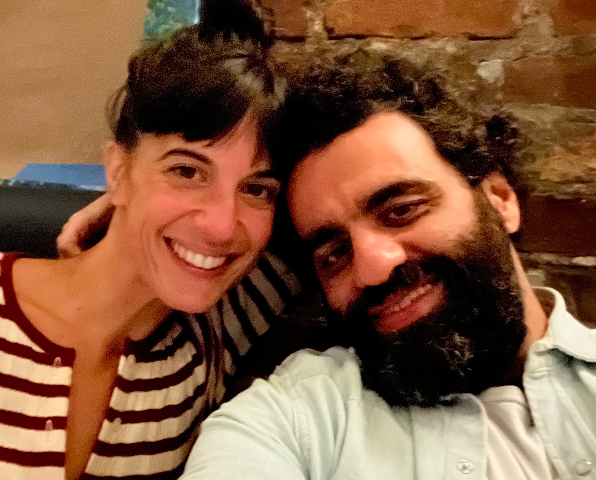 a man and a woman taking a selfie